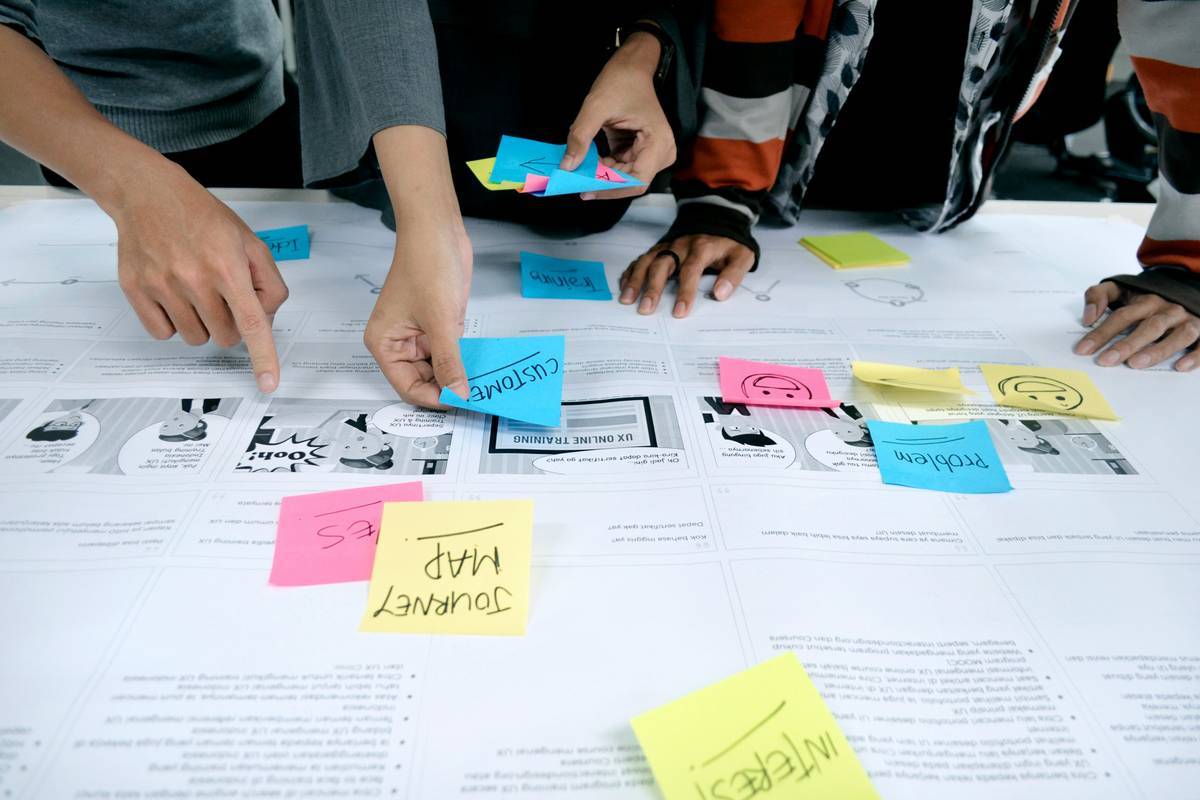 expand content marketing: sales rep using tablet to access customer-specific content during virtual meeting